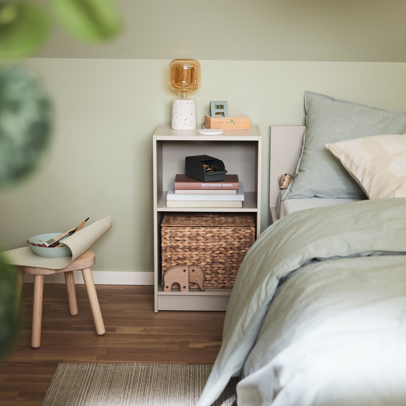 A green/stripe BERGPALM duvet cover and pillowcase