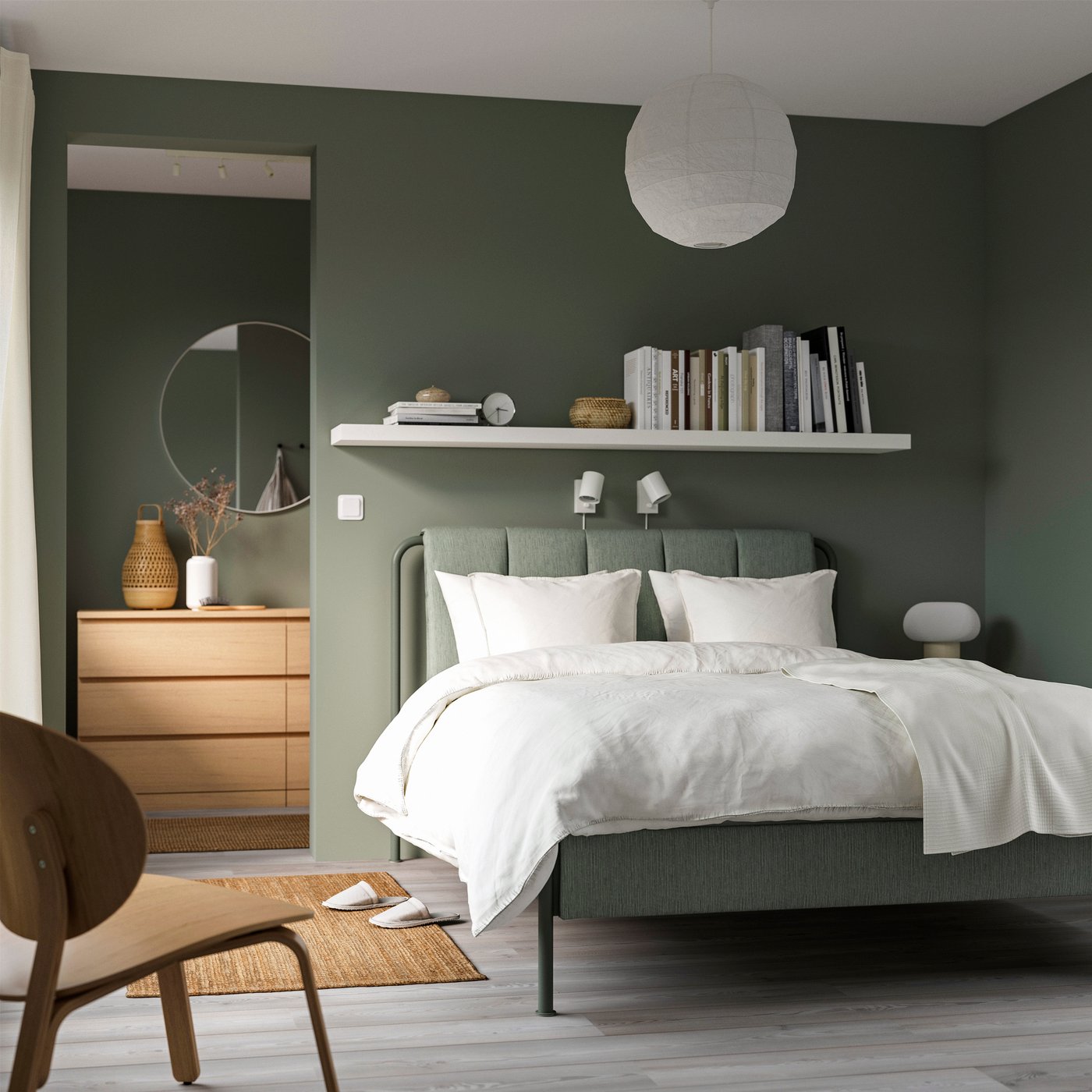 A Kulsta grey-green TÄLLÅSEN upholstered bed frame in the bedroom