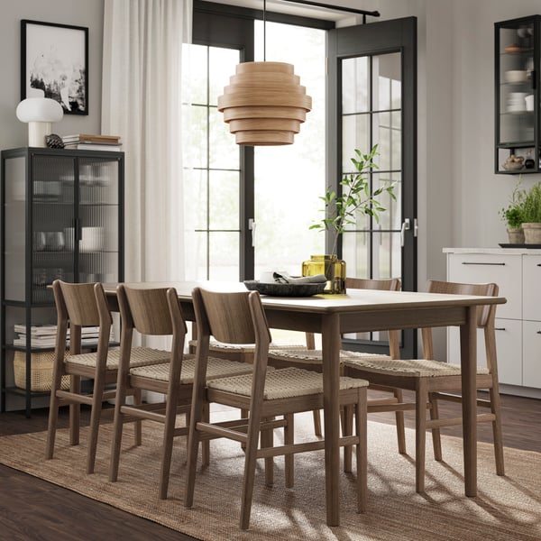 A brown beech/brown beech SKANSNÄS table and 4 chairs