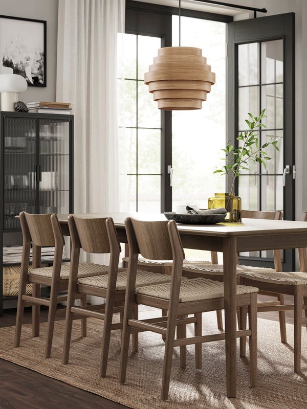 A brown beech/brown beech SKANSNÄS table and 4 chairs