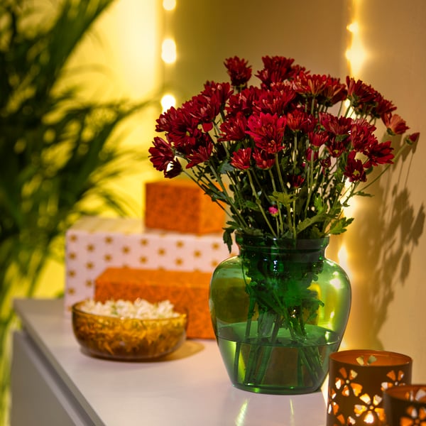 A glass/green AROMATISK vase