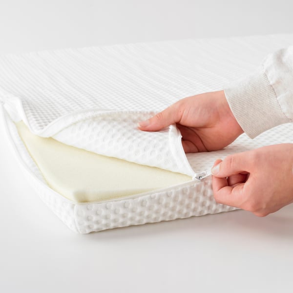 A white NORDBERGET mattress pad