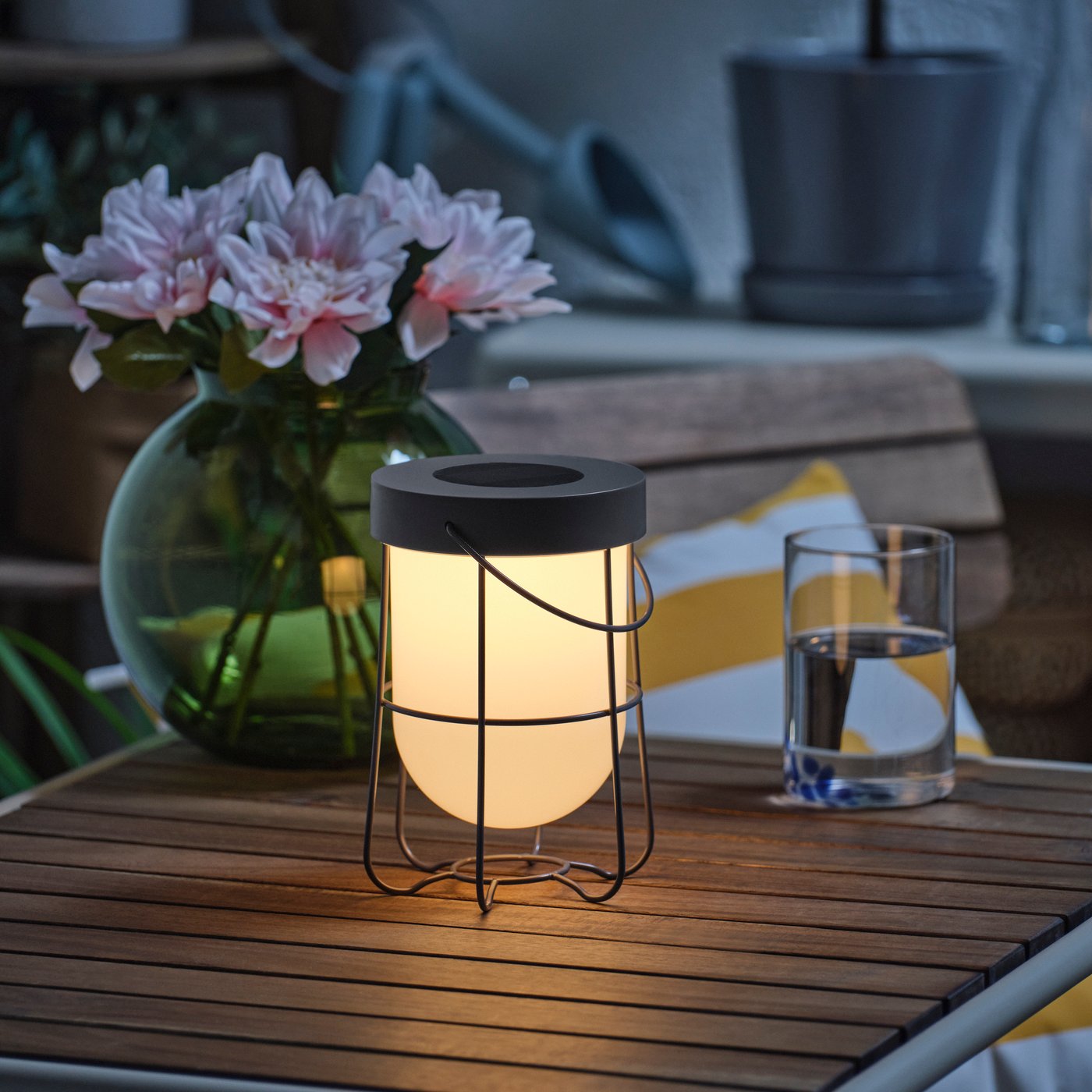 A solar-powered/grey SOLVINDEN table lamp