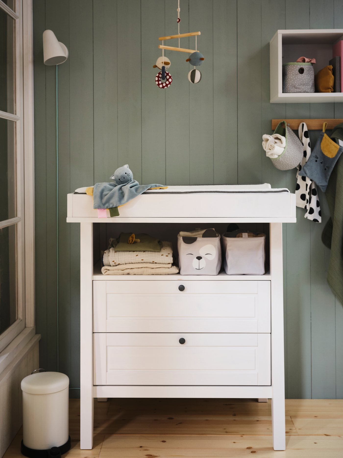 A white TOFTAN waste bin