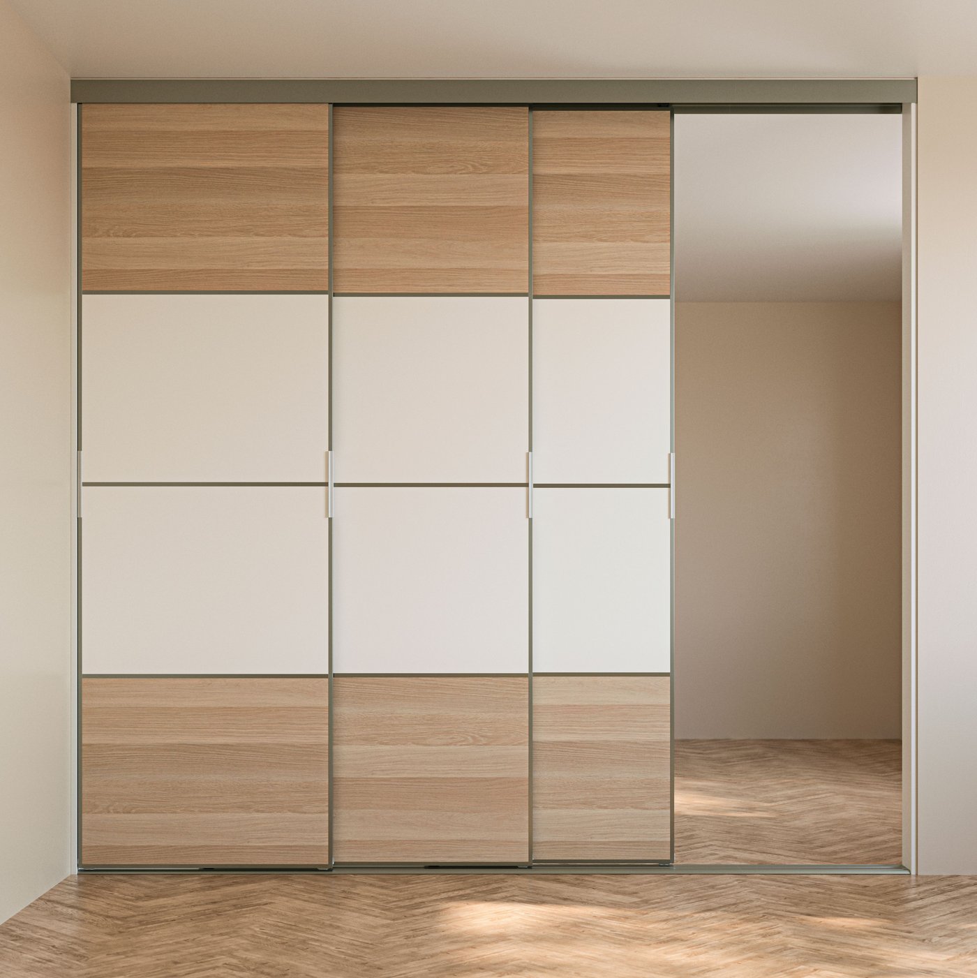 A SKYTTA sliding door solution with high door frames and white stained oak effect/white MEHAMN panels for sliding door frame.