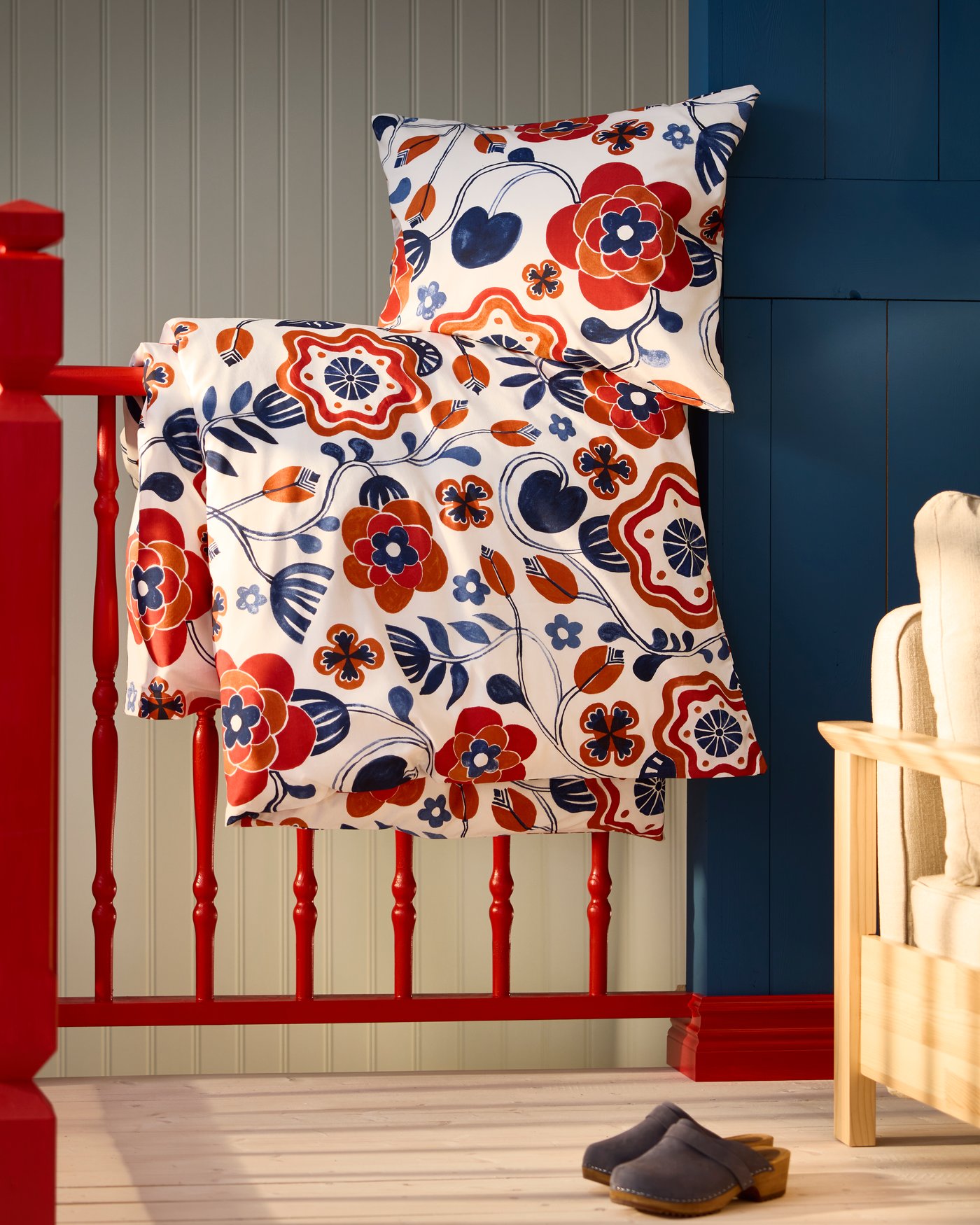 A white multicolour/floral pattern KANONVISKA duvet cover and pillowcase