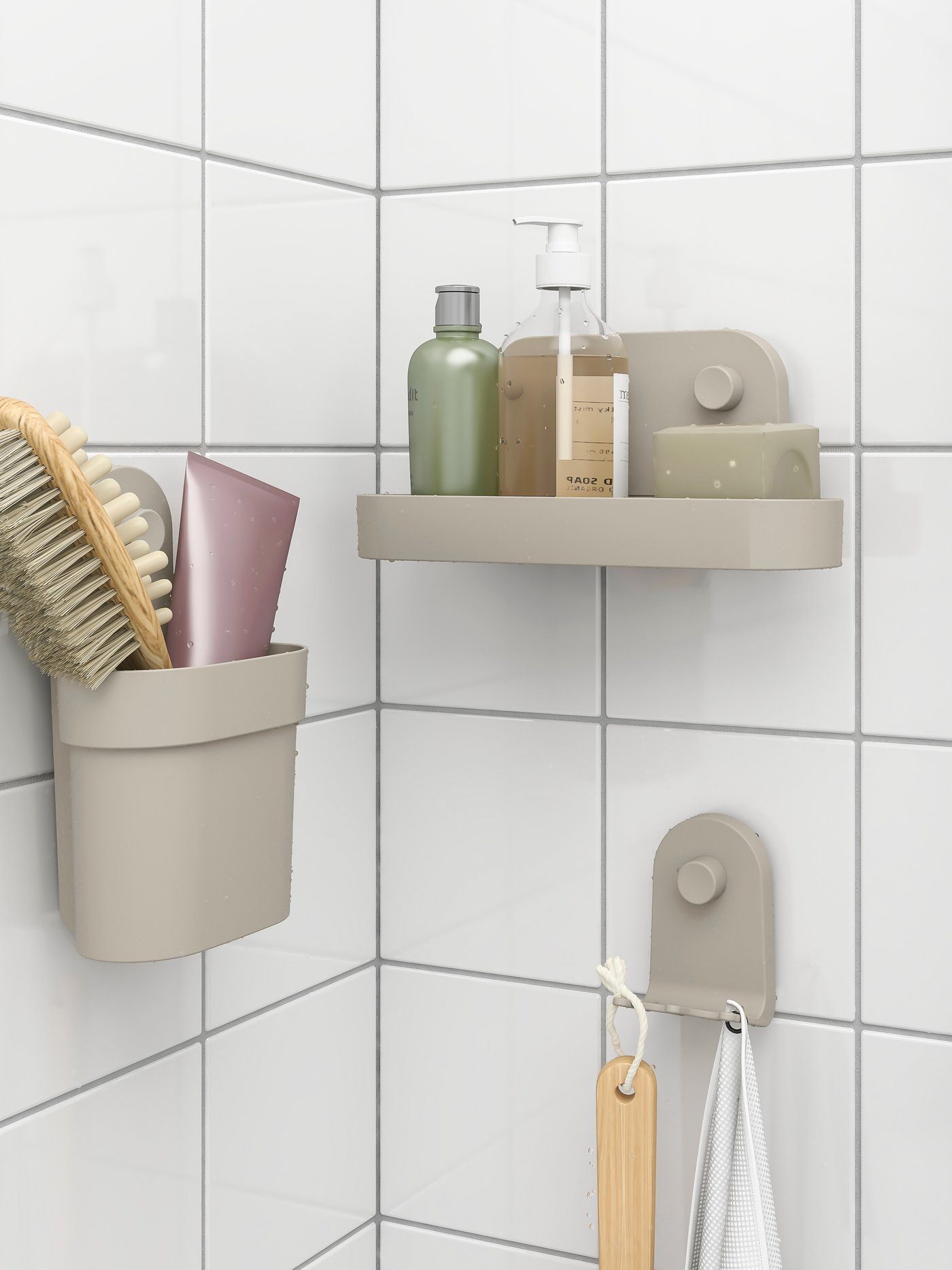 A grey-beige ÖBONÄS triple hook with suction cup