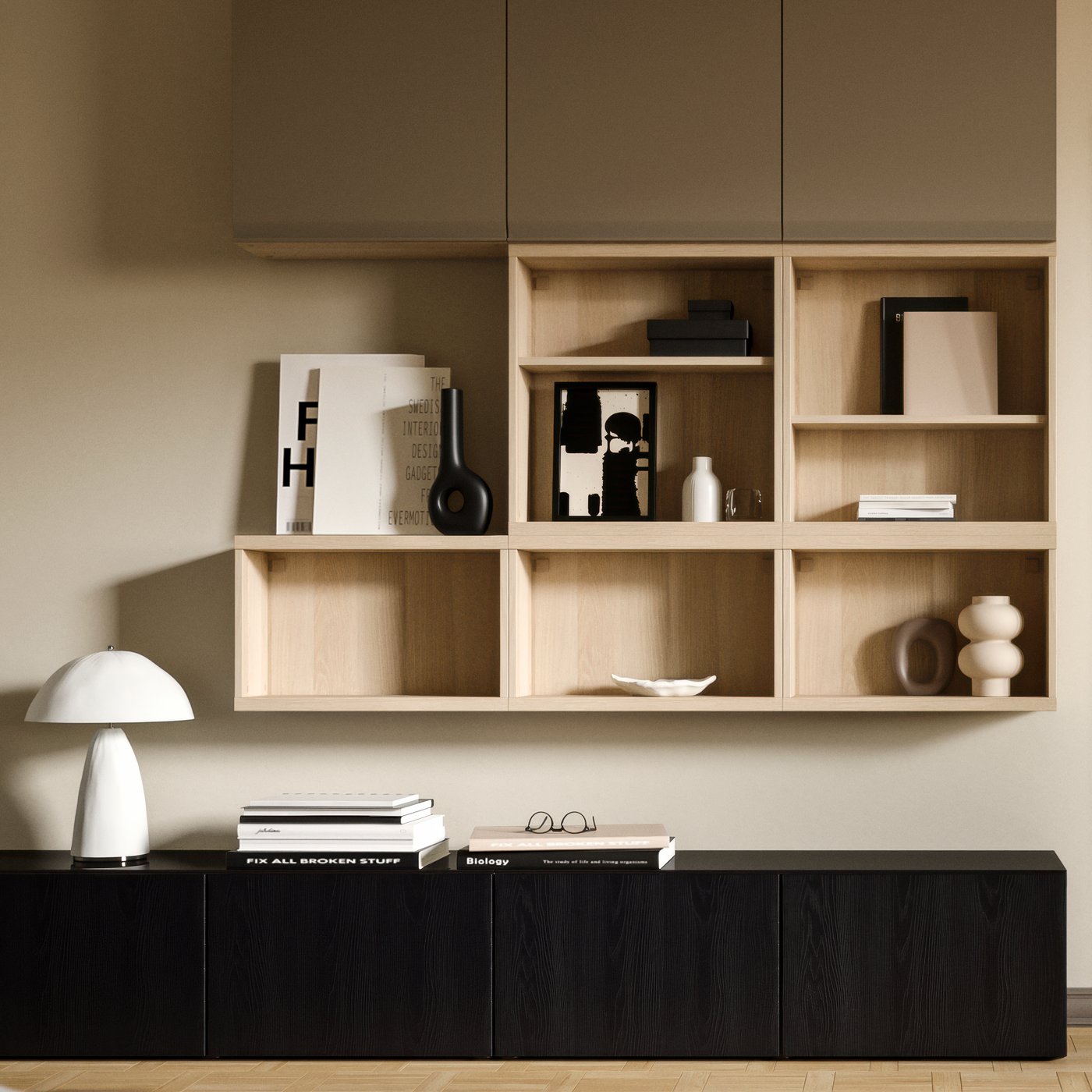 A living room wall with a variety of BESTÅ storage, including BESTÅ TV benches with doors on the floor.