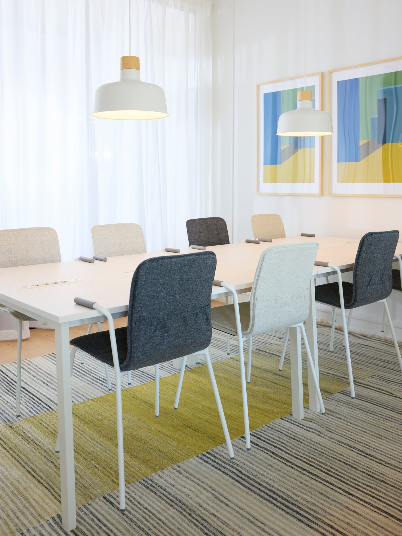 A Gunnared light beige LÄKTARE chair cover in the home office