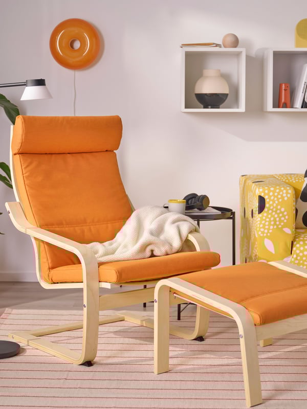 A birch veneer/Knisa bright orange POÄNG armchair and footstool