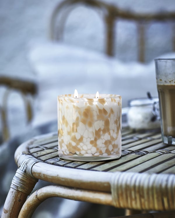 A Vanilla/light grey-beige JÄMLIK scented candle in glass, 2 wicks