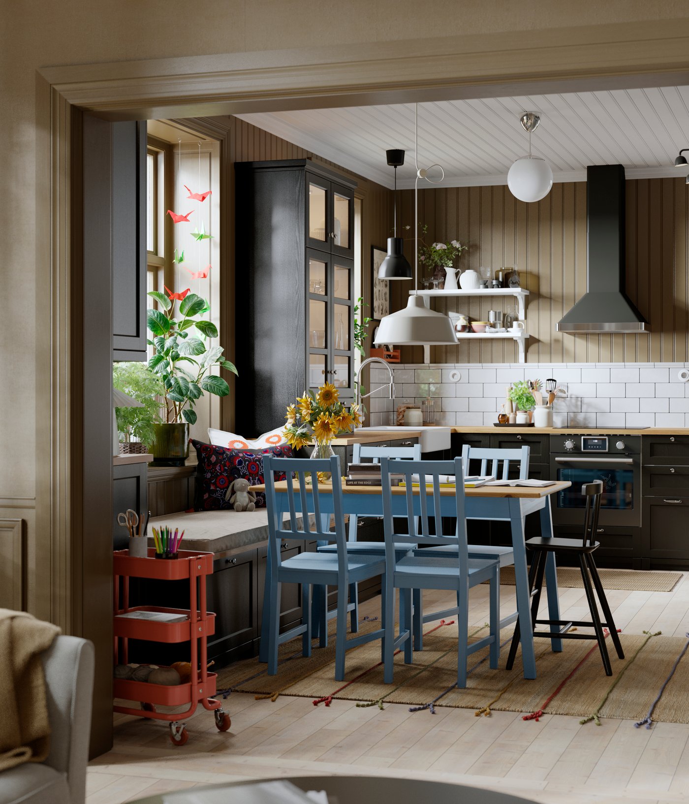 A kitchen featuring a display cabinet with black stained LERHYTTAN glass doors surrounded by cabinets and a dining area.