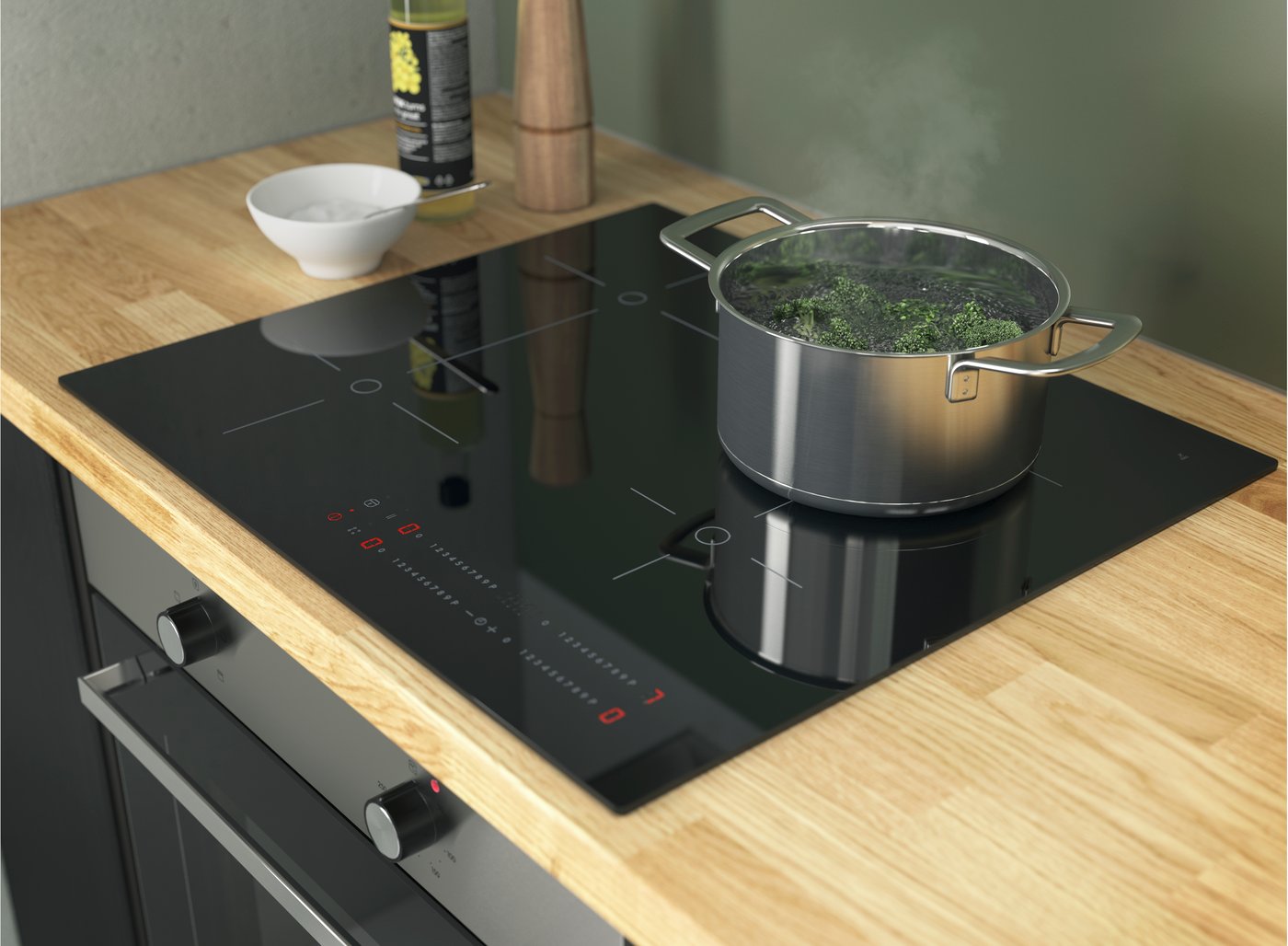 Nerezový hrnec se skleněnou poklicí IKEA 365+ v kuchyni na varné desce