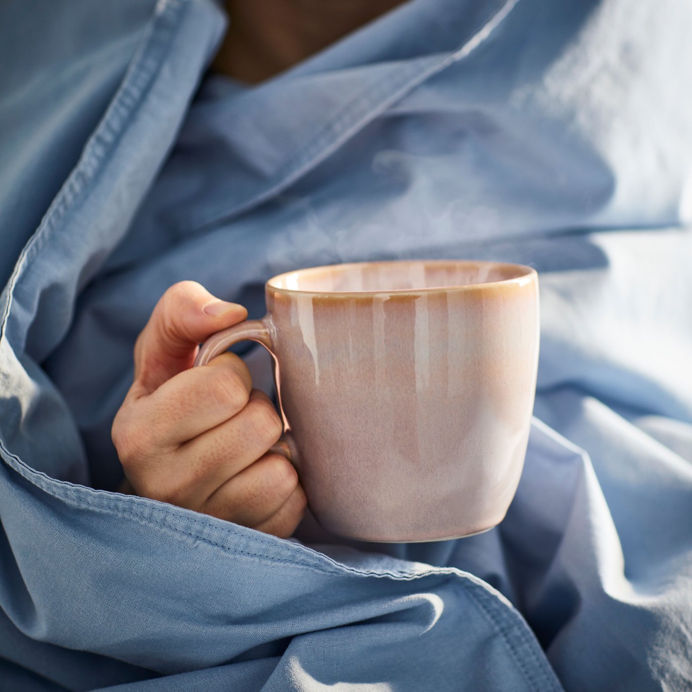 A light pink FÄRGKLAR mug
