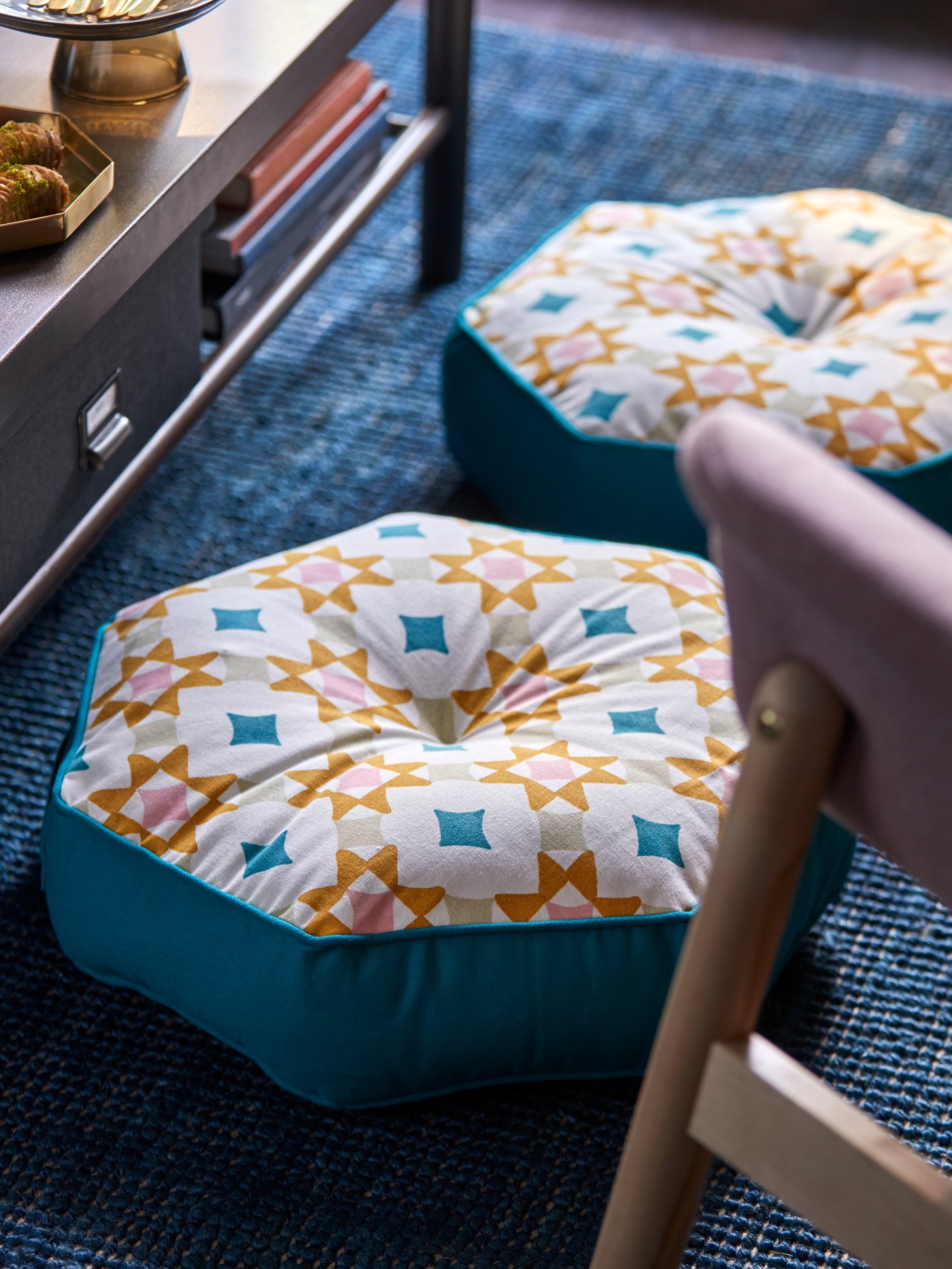 A blue/multicolour GOKVÄLLÅ floor cushion