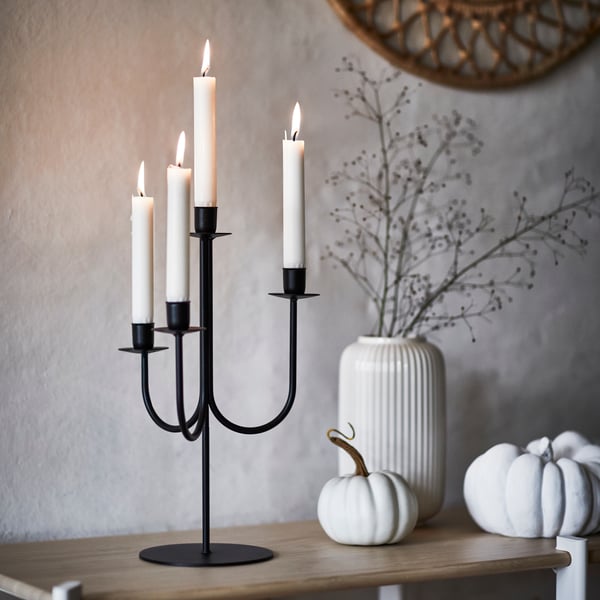 A black HÖSTAGILLE candelabra