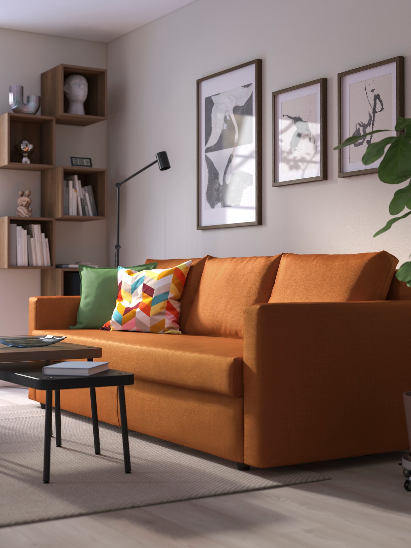 A Faringe brown-orange FRIHETEN 3-seat sofa-bed