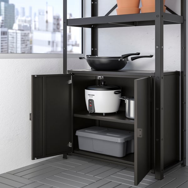 A black BROR shelving unit with cabinet