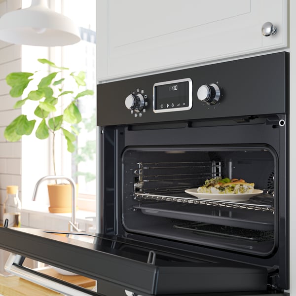 An IKEA 500 black FORNEBY microwave combi with forced air