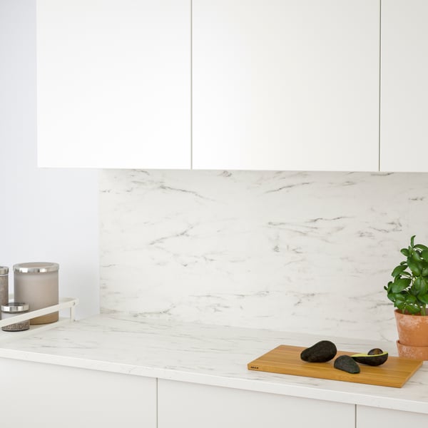 A double sided white marble effect/patterned LYSEKIL wall panel