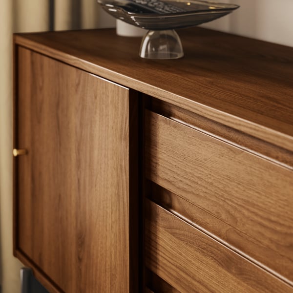 A brown walnut effect RÅDMANSÖ TV bench