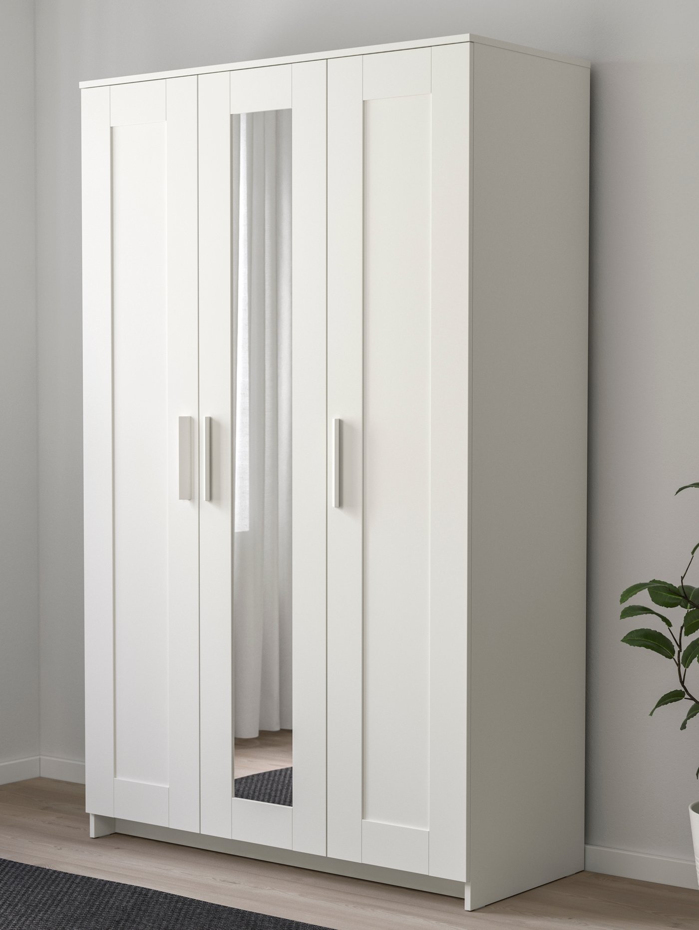 A white BRIMNES wardrobe with 3 doors