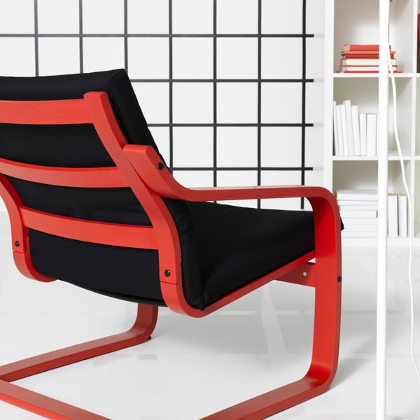 A red stained POÄNG armchair frame with low back