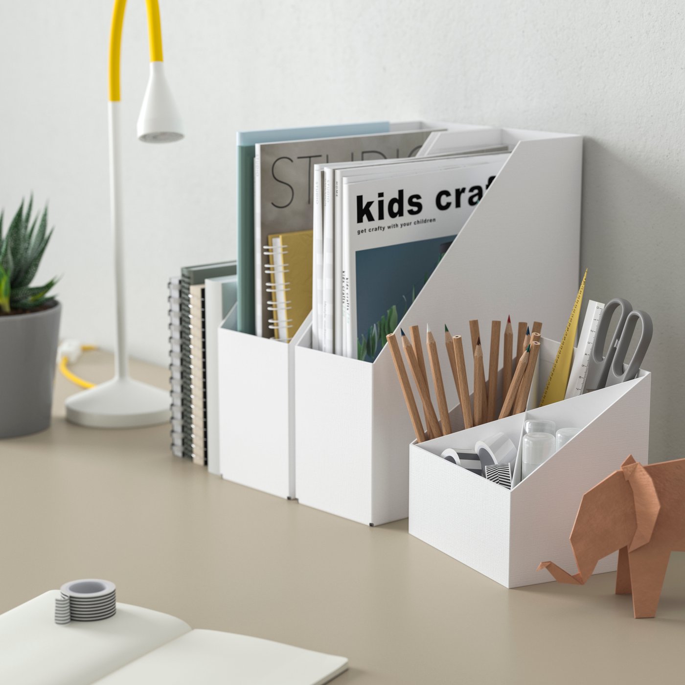 A white FJÄDERHARV desk organiser