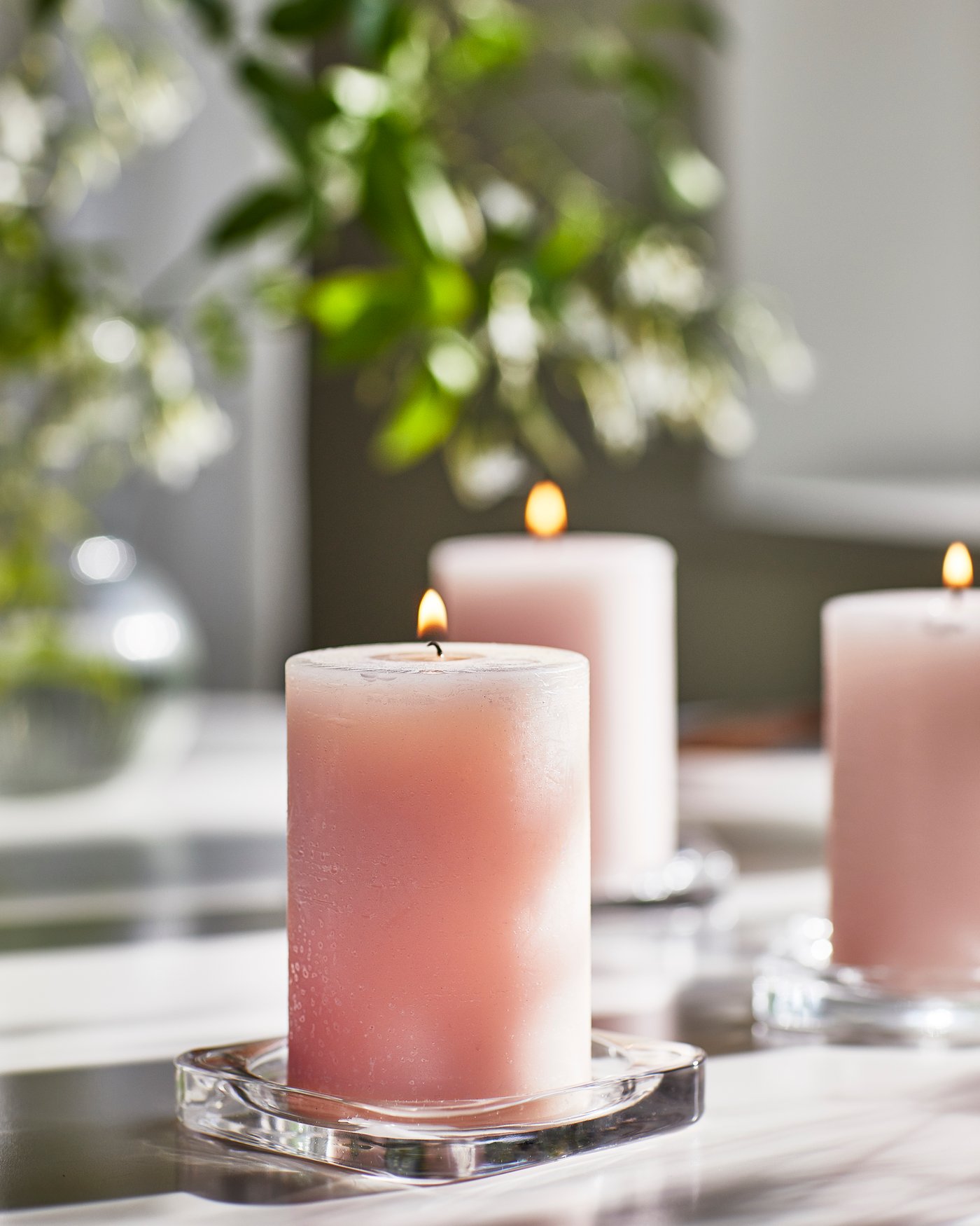 A Jasmine/pink LUGNARE scented pillar candle