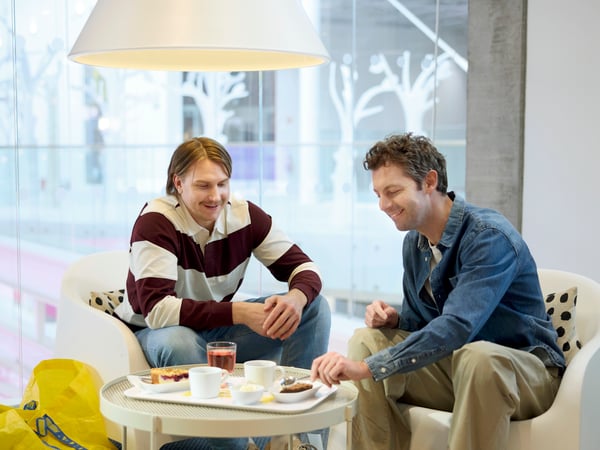 Two customers having a coffee in an IKEA restaurant.
