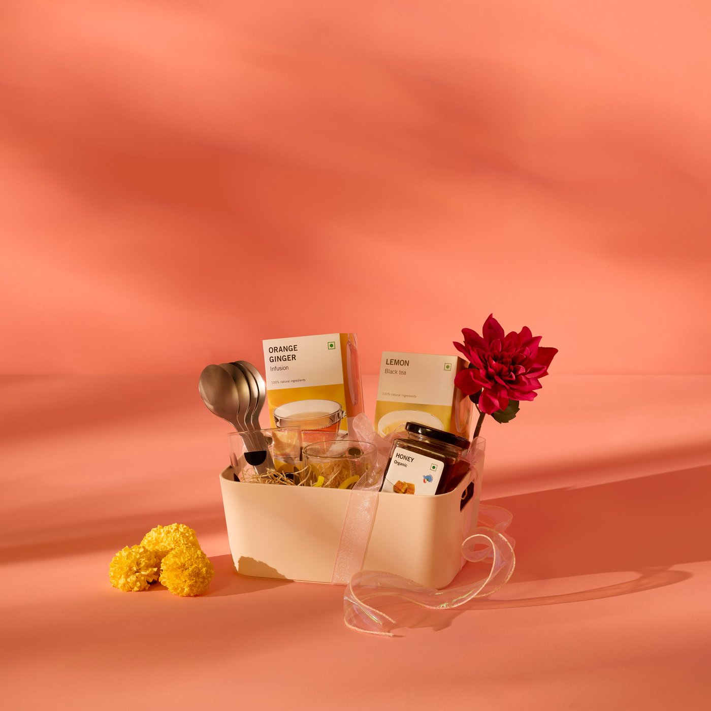 Gift Hamper 4 details: Box, mug, spoon, artificial flower.