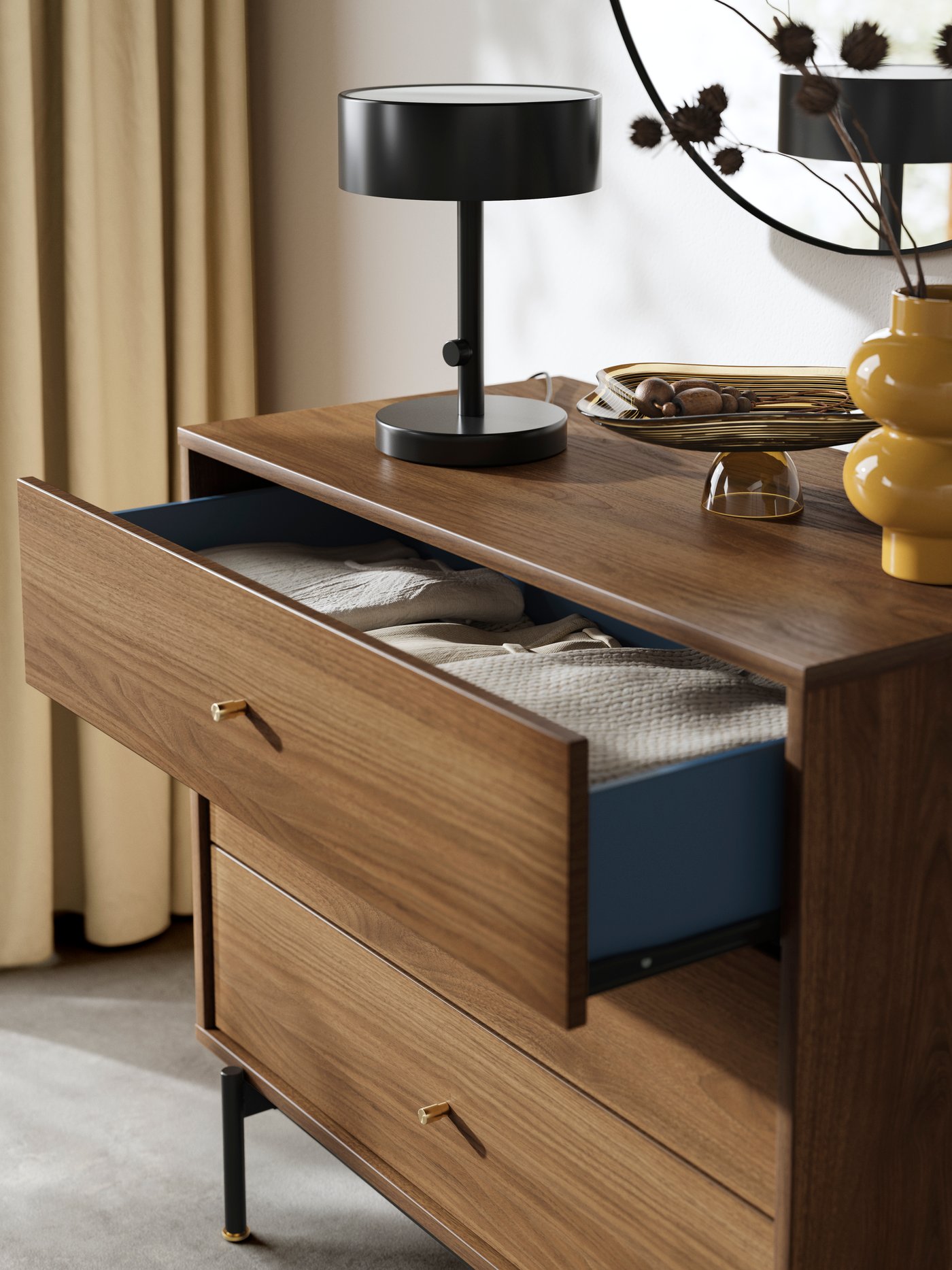 A brown walnut effect RÅDMANSÖ chest of 3 drawers