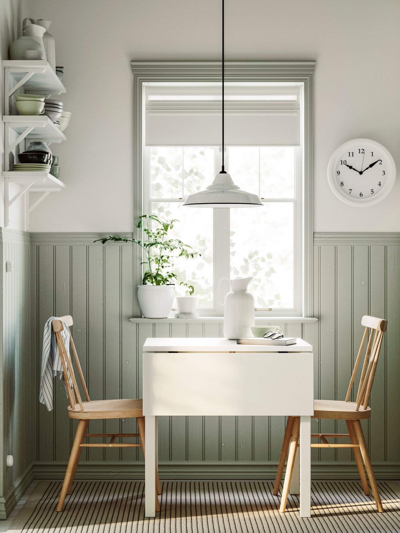 A light grey-beige KÖRSBÄRSBJÖRK plant pot in the dining room