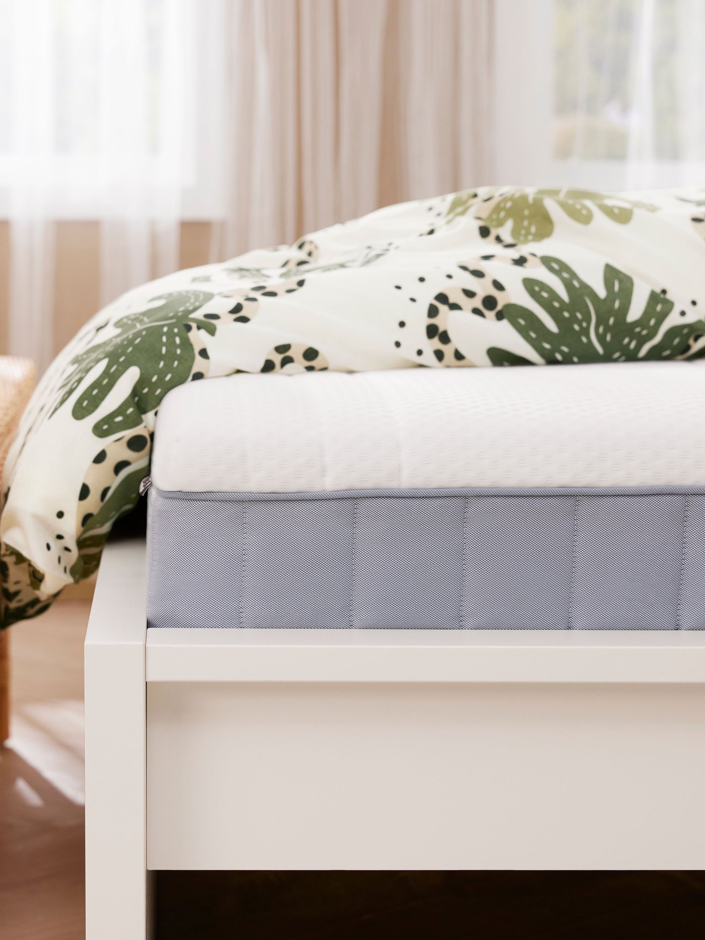 A handmade rattan TOLKNING bench with storage