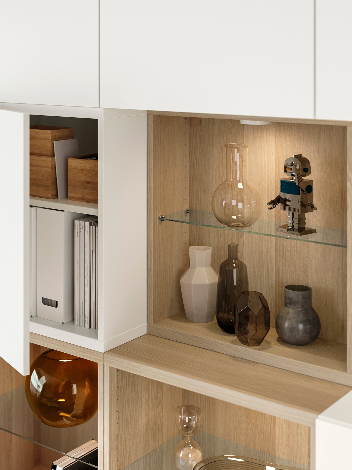A close-up of a white stained oak/white LAPPVIKEN BESTÅ storage combination shows various objects displayed on glass shelves.