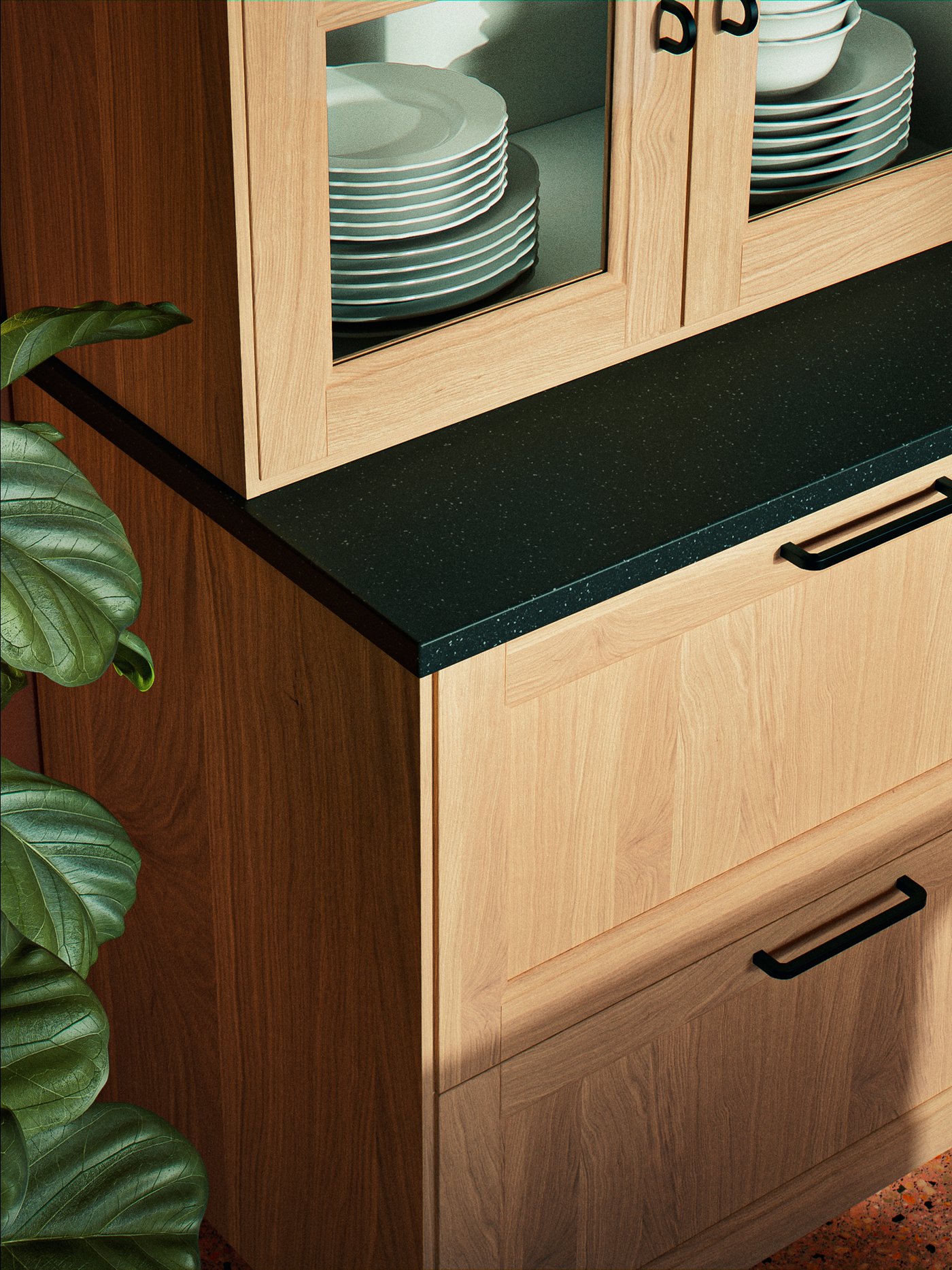 An oak VEDHAMN glass door in the kitchen