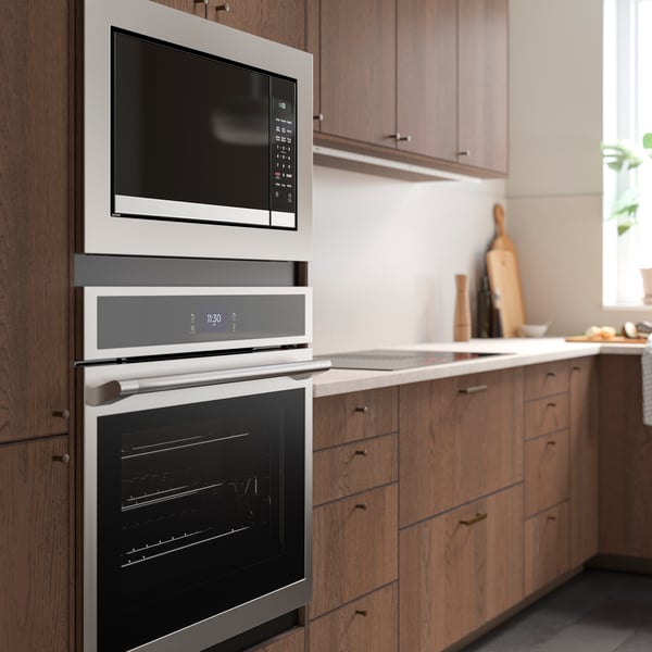 A stainless steel HJÄLTEBY wall ov w true conv+self-cleaning