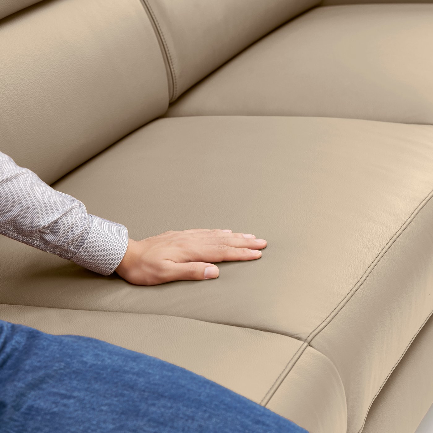 A Grann/Bomstad beige RULLERUM 2-seat sofa with electric recliner