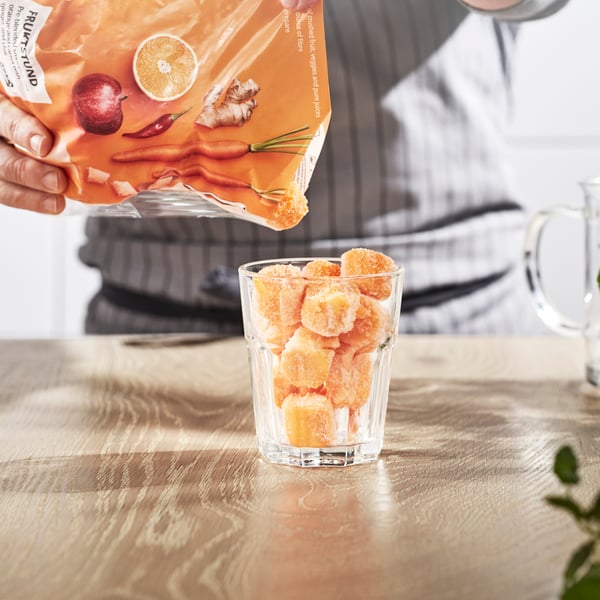 An orange and carrot with ginger and chili/frozen FRUKTSTUND pre-blended smoothie mix