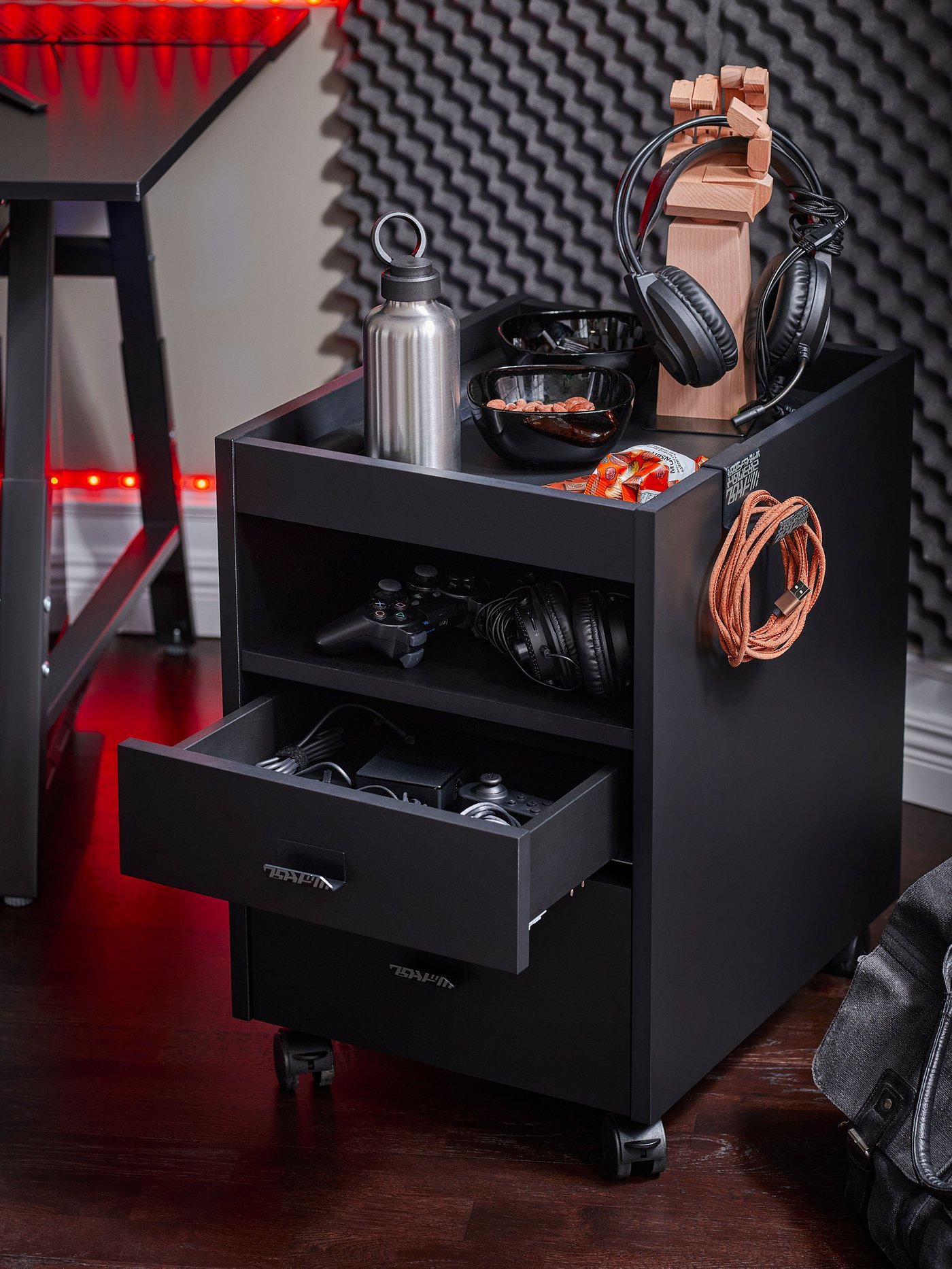 A black UTESPELARE gaming desk