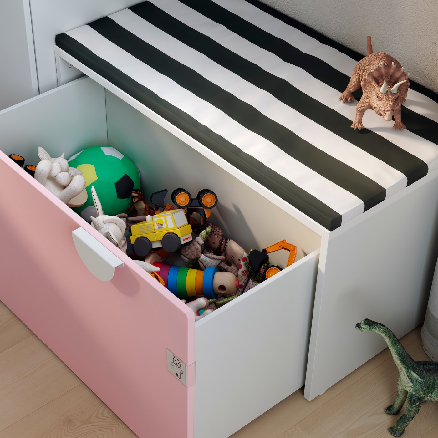 A white/pale pink SMÅSTAD bench with toy storage