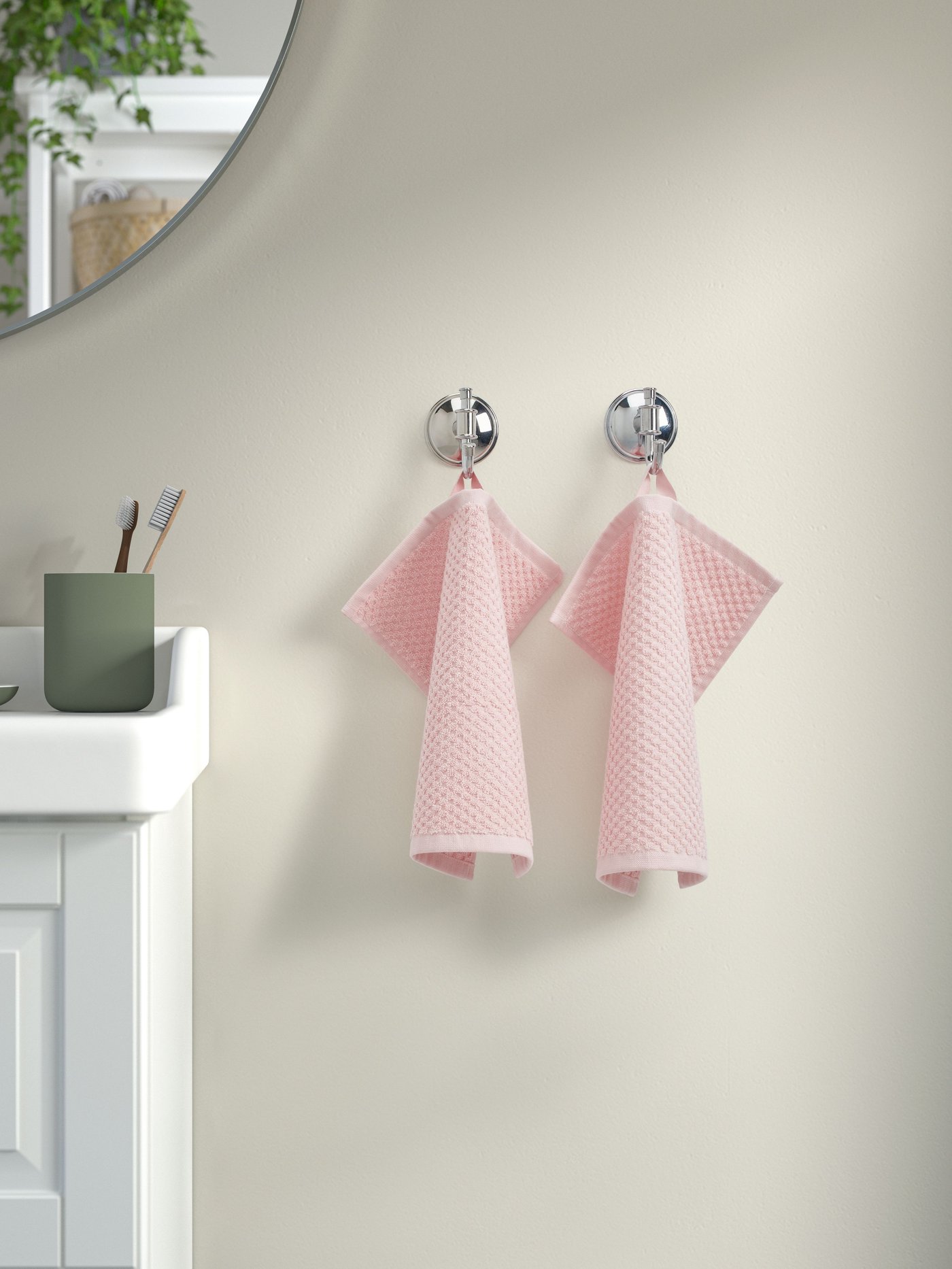 A pale pink GULVIAL washcloth