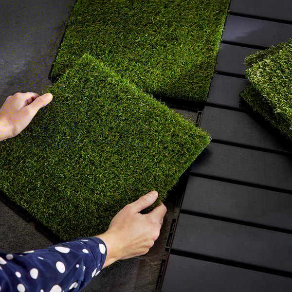 An artificial grass RUNNEN floor decking, outdoor outside
