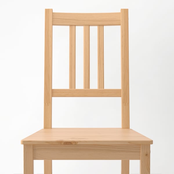 A light brown stained PINNTORP chair