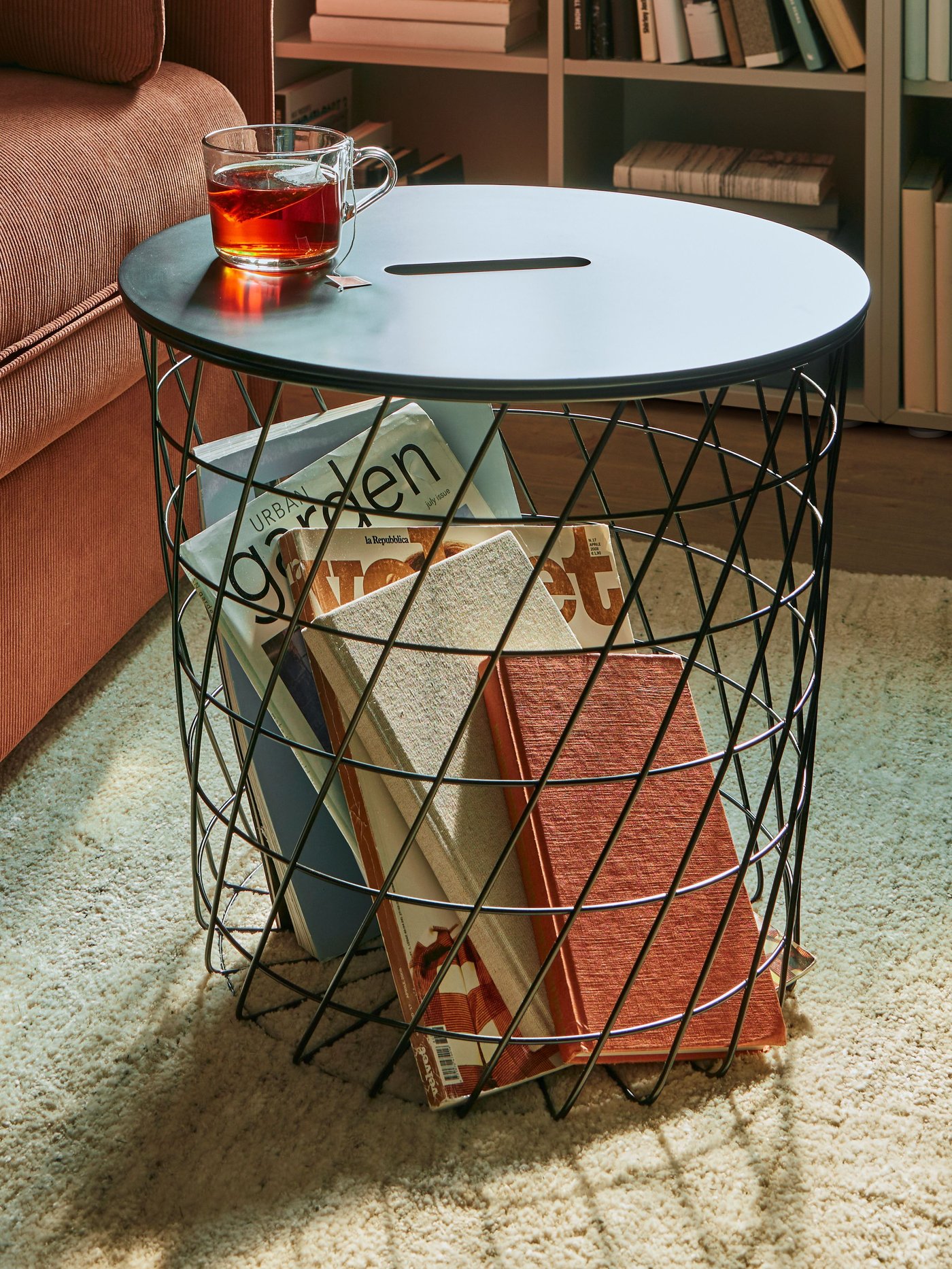 A black KVISTBRO storage table in the living room