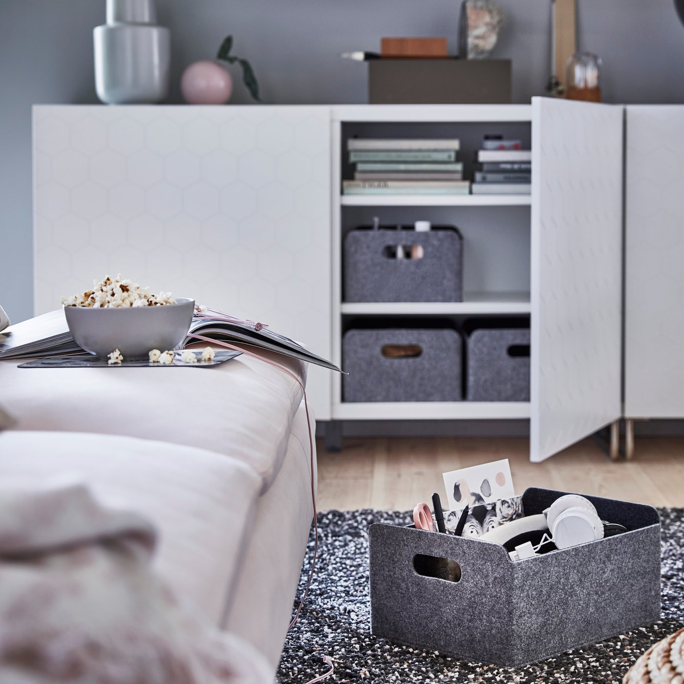 A grey BESTÅ box in the living room