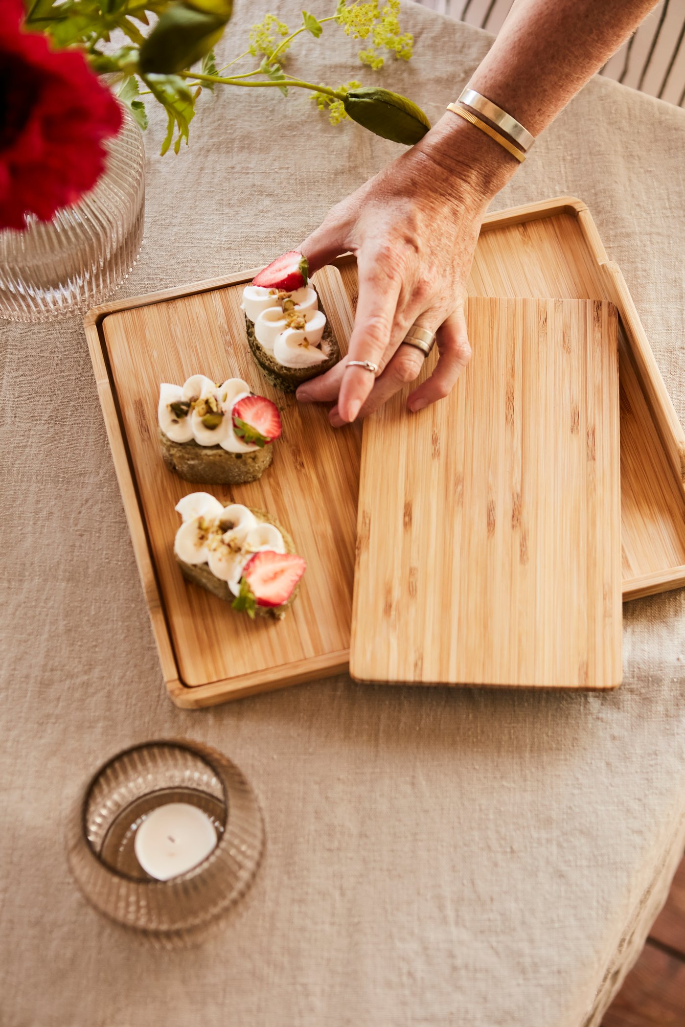 A woman is planting cupcakes 