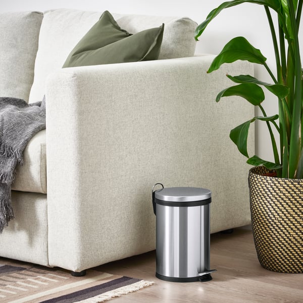 A stainless steel SNÖRPA pedal bin