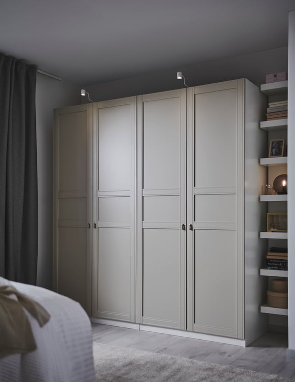 A white URSHULT LED cabinet lighting in the bedroom