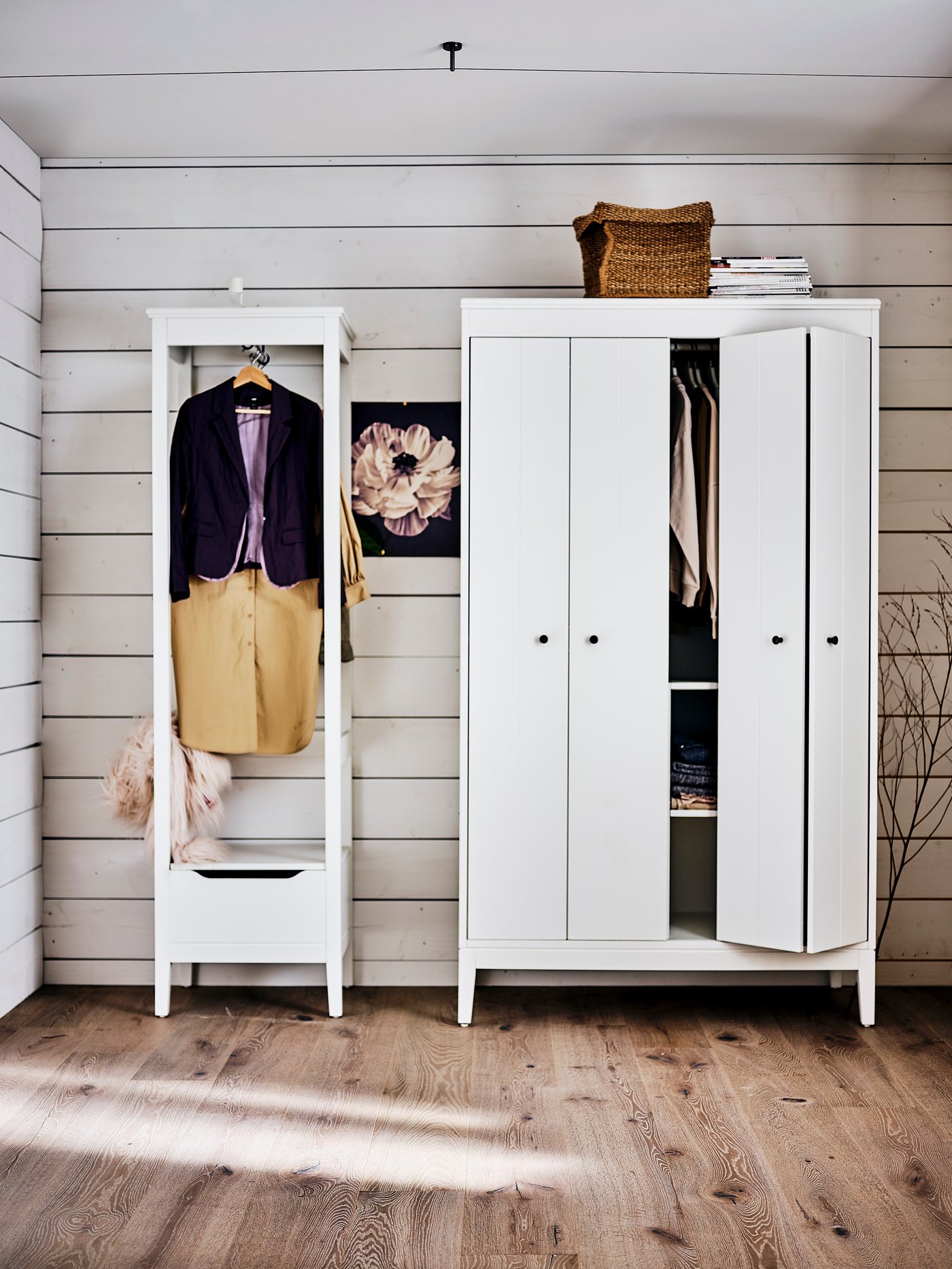 A white IDANÄS wardrobe in the bedroom